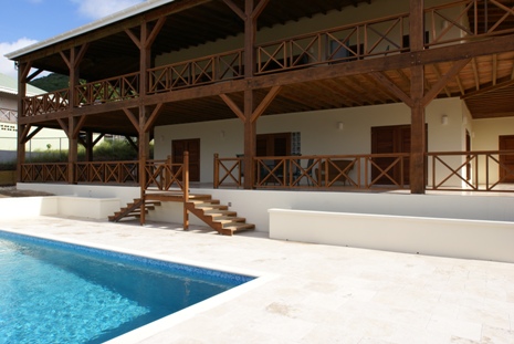 The lower deck and pool at Villa Windsong